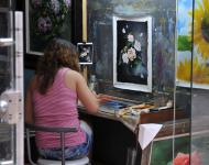 18在这里第一个见到的女画师，摁下快门