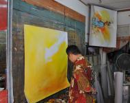 12半个钟都没有一幅已经挂在墙上，另一幅底色也铺好……画风也如他人一样奔放！